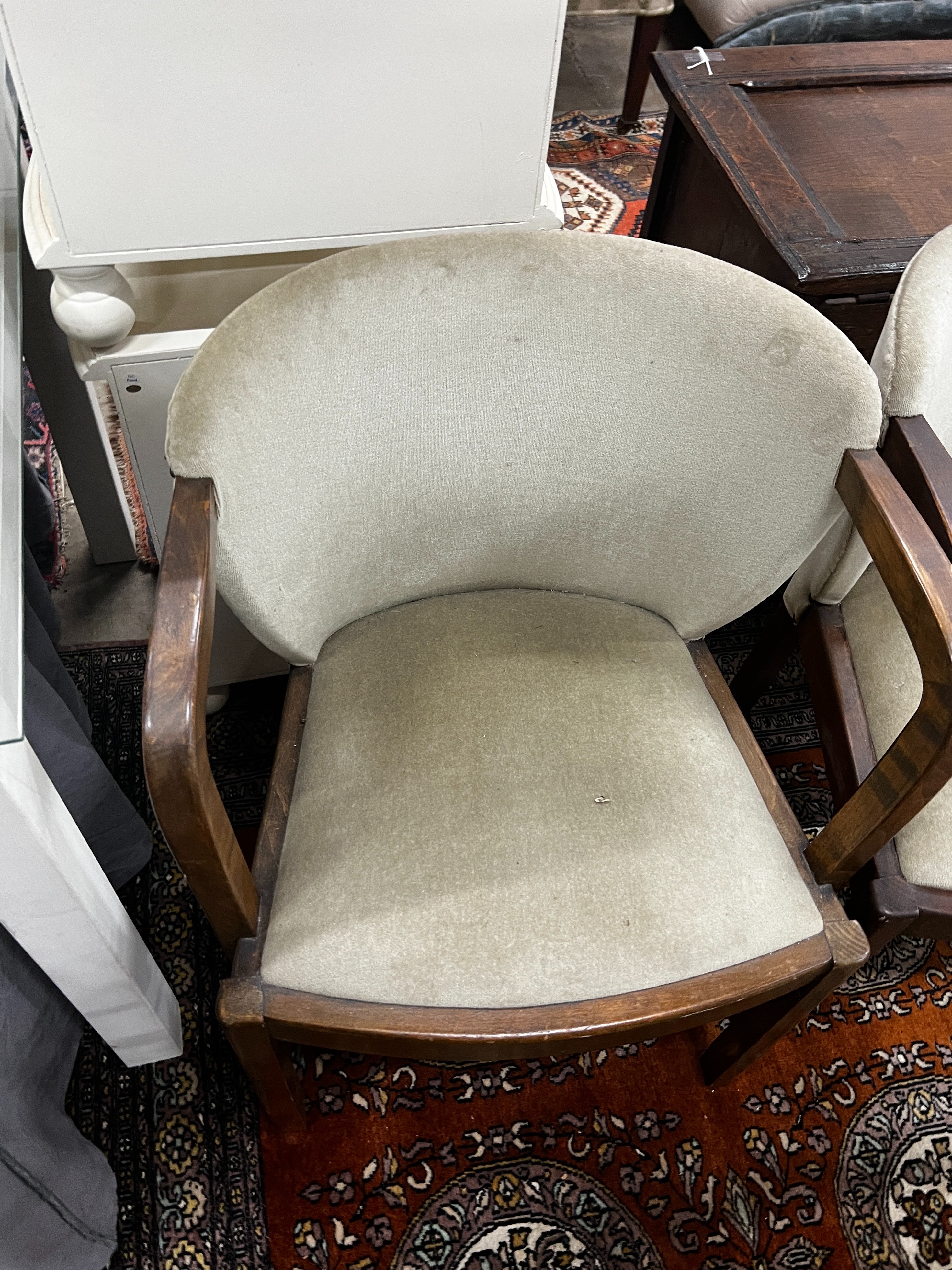 A set of four Art Deco style walnut upholstered tub elbow chairs, width 55cm, depth 54cm, height 78cm